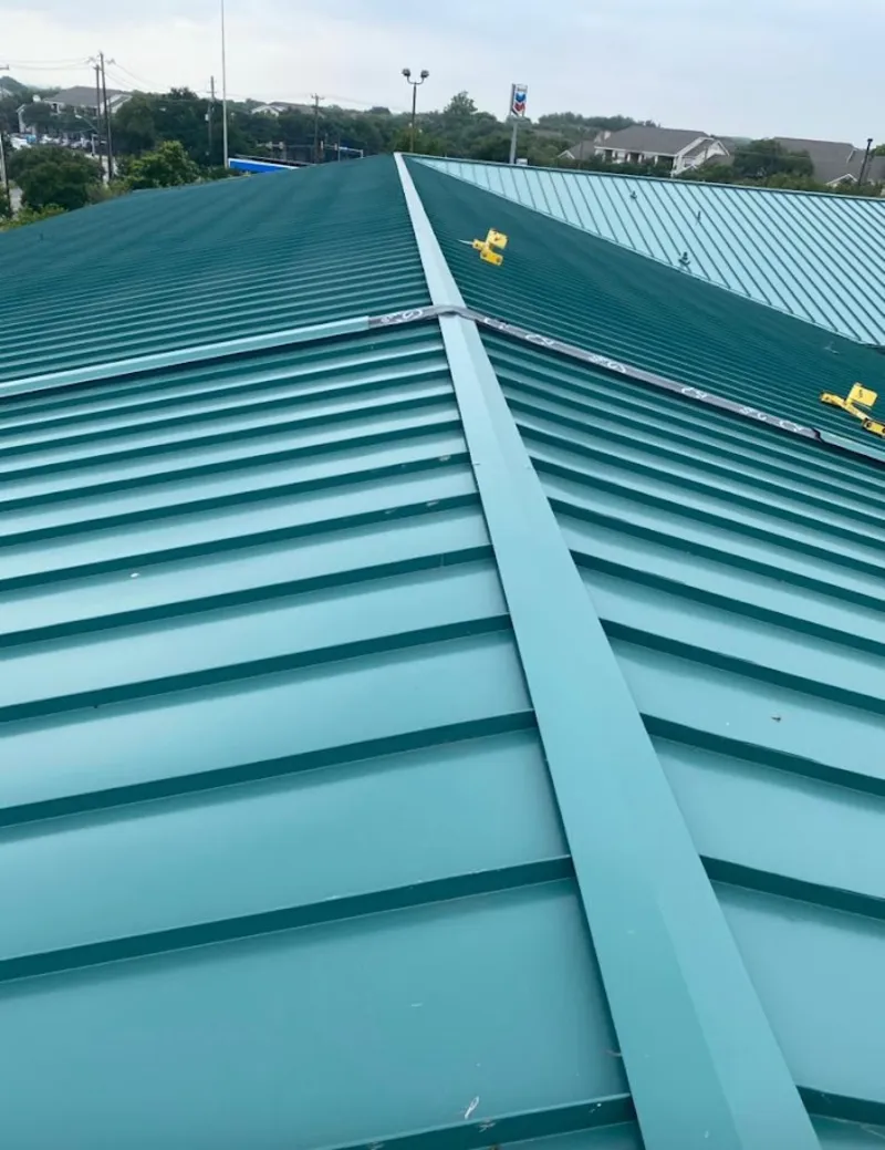 Green commercial metal roof ridge and valley for Metal Roof Repair in Buckhead